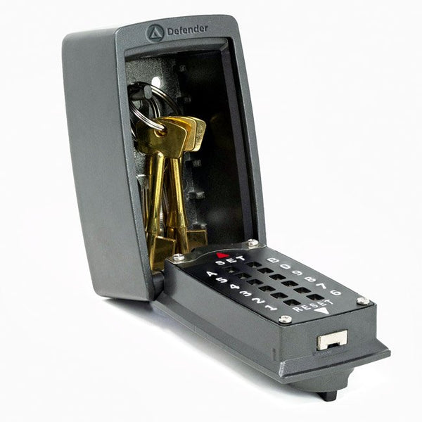 Key safe with keys inside on a white background